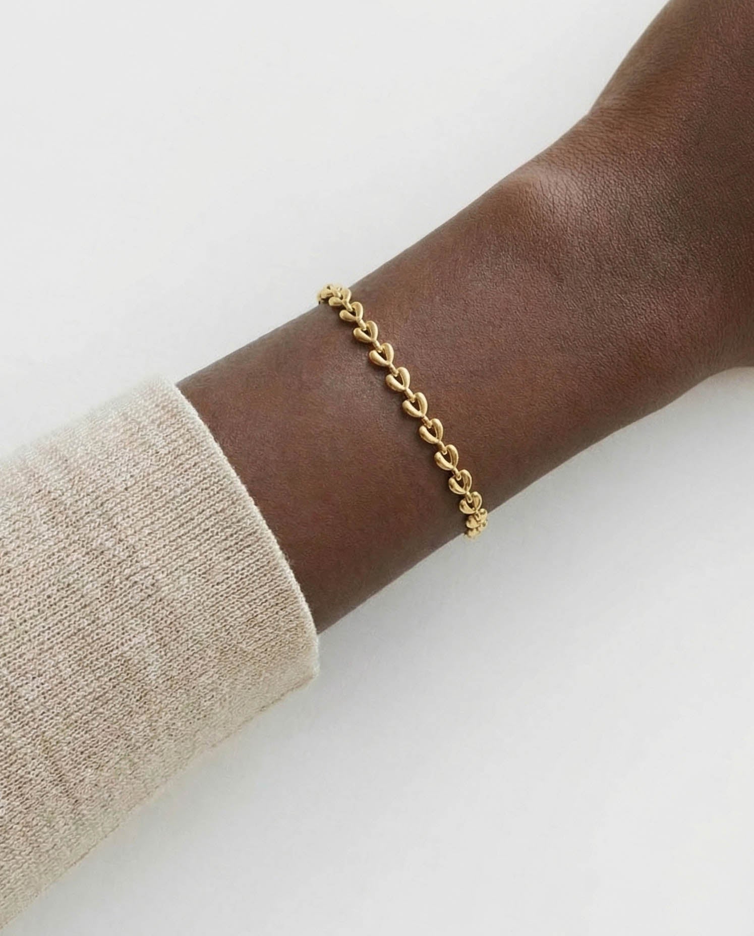 Pulsera Corazones 18K