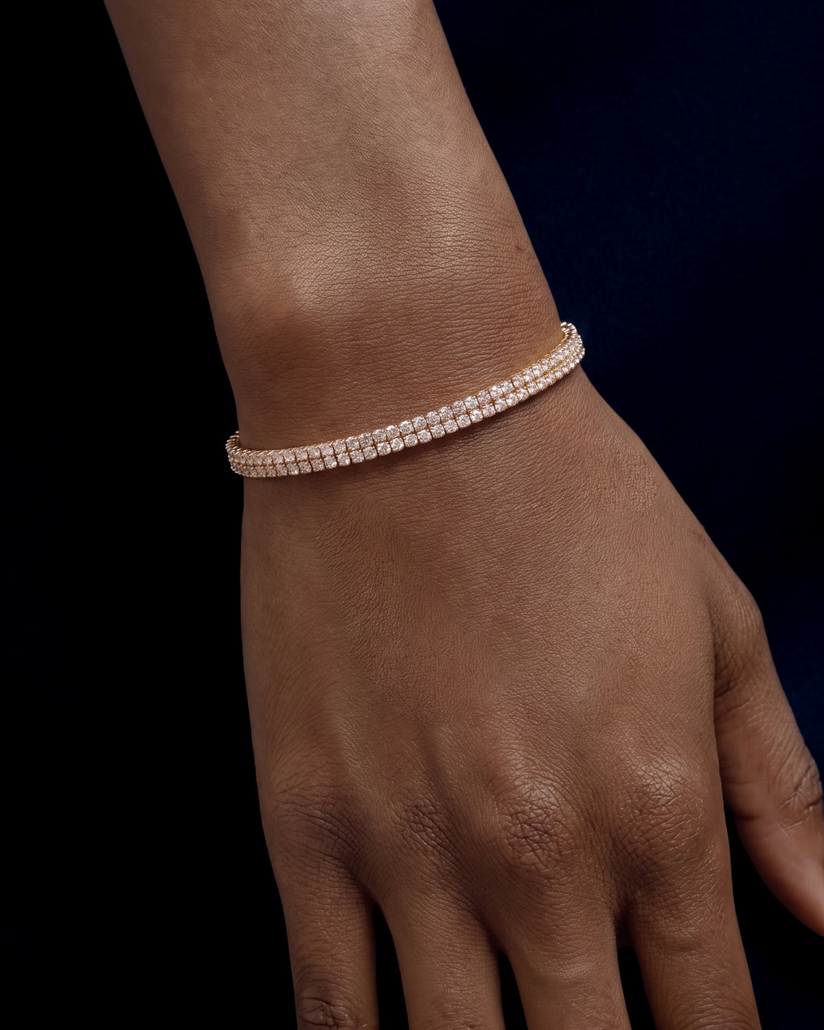 18 Karat grünes Tennisarmband