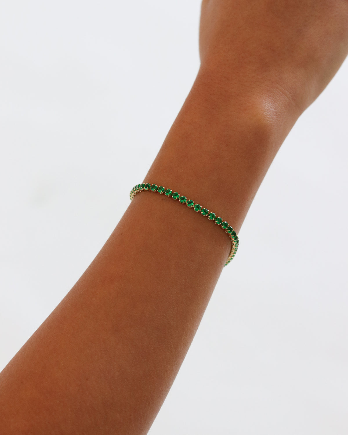 Bracelet tennis vert 18 carats
