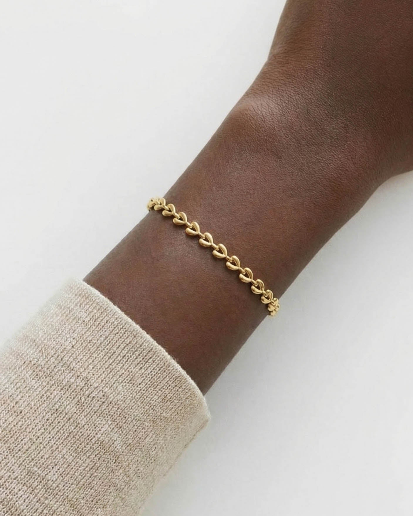 Pulsera Corazones 18K